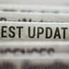 Paper with the words "latest updates"