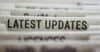 Paper with the words "latest updates"