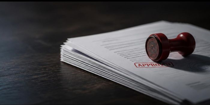 USCIS RFE policy change documents with official stamp